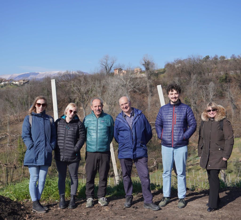 Dylan and staff at the Perlage Winery, Italy