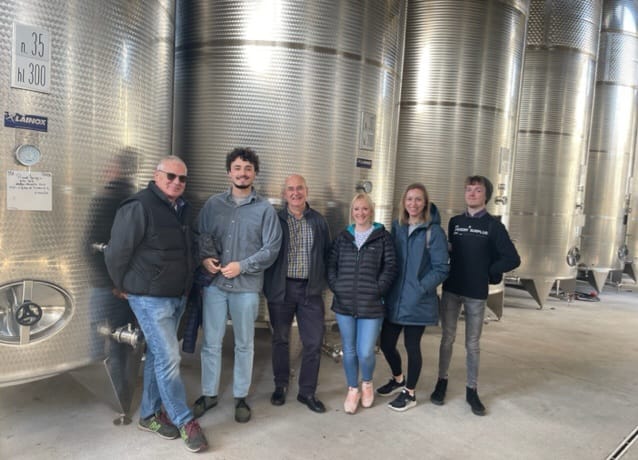 Dylan and staff at the Bidoli winery, Italy