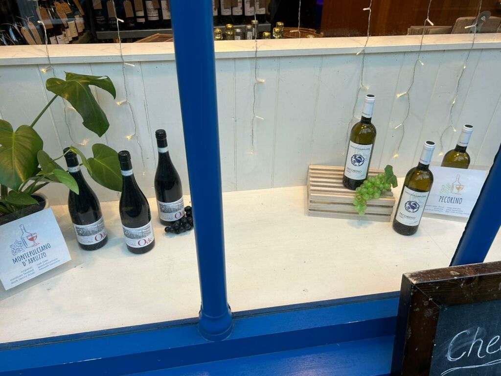 Bottles of Montepulciano in Gwin Dylanwad Wine window
