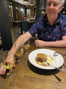 Dylan with 3 glasses of dessert wine in The Old Bridge Hotel