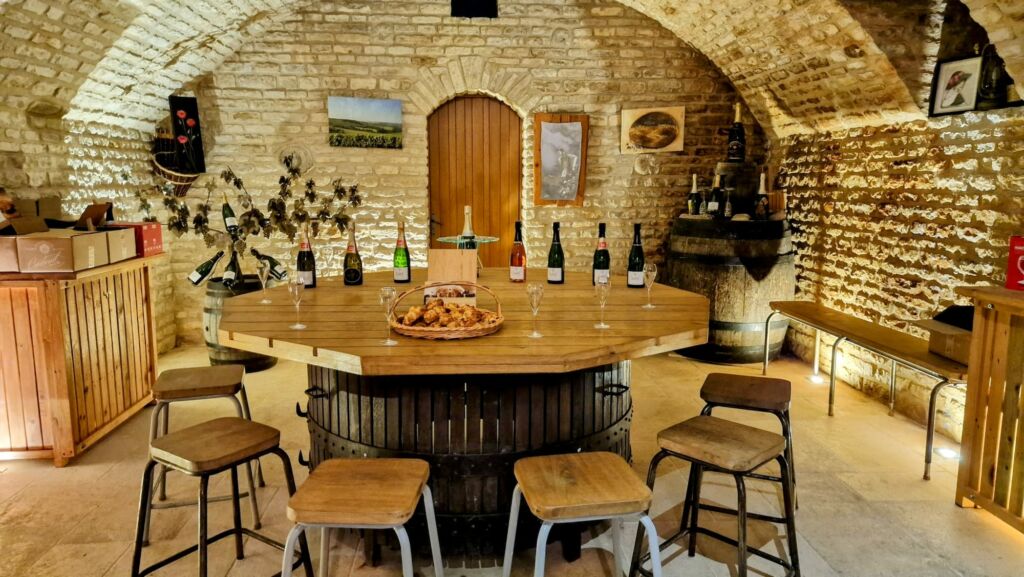 The cellar in Champagne Cordeuil Pere et Fille with the grand tasting table.